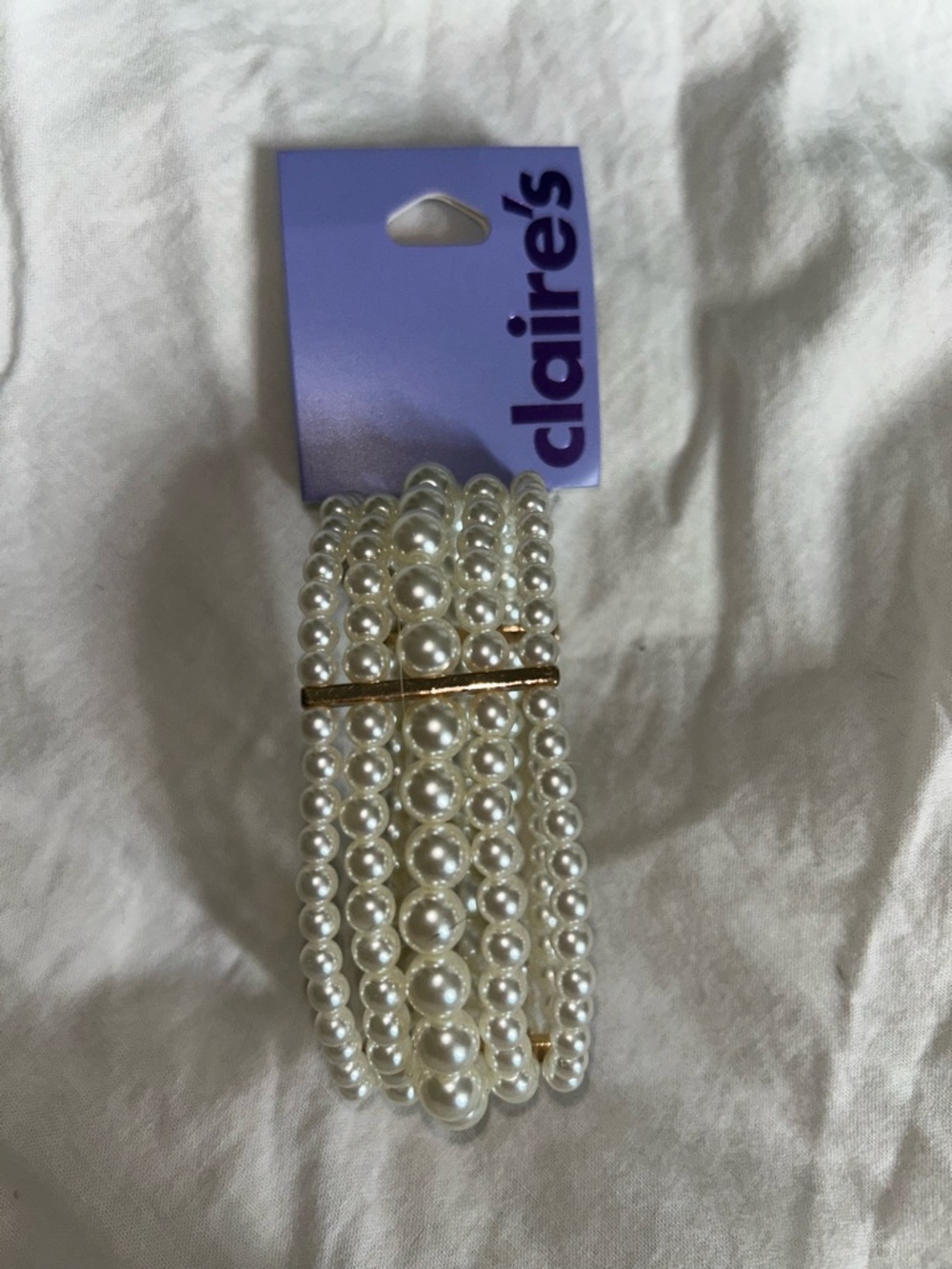 Claire's White Faux Pearl Multi-Strand Stretch Bracelet with Gold Accents